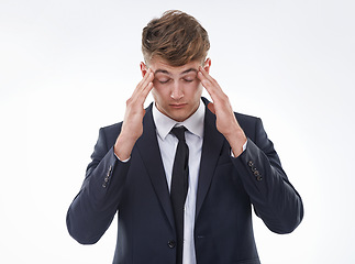 Image showing Man, eyes closed and tired for headache, stress and work on mockup in studio on white background. Worried, frustrated and businessman for anxiety, migraine and thinking of burnout and mental health