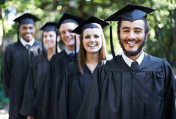 Image showing Graduation, university and man for portrait, ceremony and friends for education and college for diploma. Outdoor, degree and celebration for classmates, campus and certificate with cap and gown