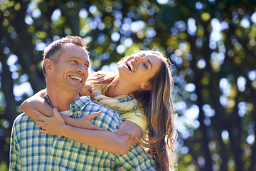 Image showing Piggy back, laugh and couple in park for summer romance, trees and fun outdoor date with smile. Love, mature man and happy woman in garden with morning sunshine, hug and marriage bonding in nature.
