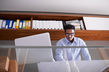 Image showing Thinking, documents and business man with laptop for internet, website and online project by desk. Professional architect, paperwork and worker with computer for floor plan, ideas and blueprint