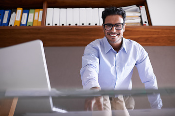 Image showing Portrait, office and business man with laptop for internet, website and online project by desk. Professional, corporate consultant and worker with computer for planning, networking and connection