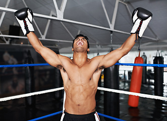 Image showing Boxer, man and gym with celebration, boxing ring and smile for workout or training. Person, exercise and fitness for health, wellness and achievement or winning with cardio for professional fight