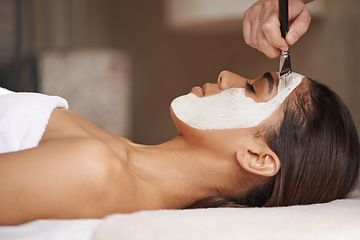 Image showing Skincare, clay and woman with face mask at spa for glow, wellness and beauty routine with self care. Cosmetic, pamper and female person relaxing for natural facial dermatology treatment at salon.
