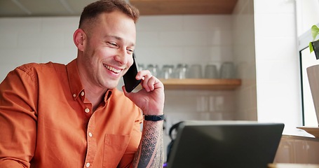 Image showing Man, freelancer and laughing on phone call at home, happy and networking in kitchen. Male person, communication and mobile application for online conversation, laptop and remote work or research