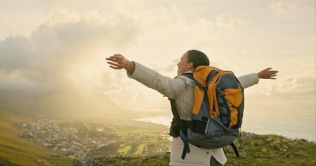 Image showing Woman, mountains and freedom, celebration or excited for hiking goals, travel achievement and adventure in nature. Person or winner with backpack, yes and gratitude for trekking success and cityscape