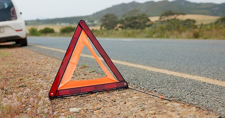 Image showing Road, triangle and car breakdown for shape, sign or vehicle assistance in the outdoor countryside. Asphalt, street or sidewalk safety symbol for warning, signal or traffic control to alert attention