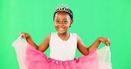 Image showing Portrait, black girl and cute in studio with greenscreen, isolated and princess costume for halloween or birthday party. Child, chromakey display and mockup background for youth and ballet dance