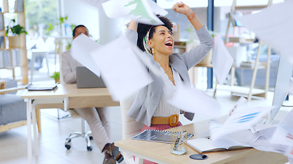 Image showing Excited woman, business and documents in air for celebration, success or done with work at office. Happy female person or accountant with fist pump and finished paperwork for winning at workplace