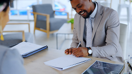 Image showing Black man, writing and documents with contract for signature, deal or agreement on office desk. African businessman, employee or intern filling out form, application or paperwork in recruit or hiring