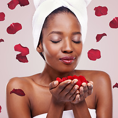 Image showing Dermatology, towel and black woman with red petals, cosmetics or wellness on white studio background. Aesthetic, African person or model with natural beauty or grooming with treatment or healthy skin