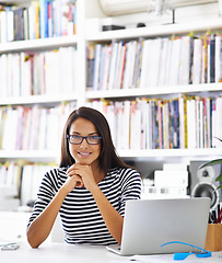 Image showing Portrait, happy woman and student at desk in home for remote learning, study or distance education on laptop in house. Face, glasses and smile of person at table on computer in Brazil in apartment