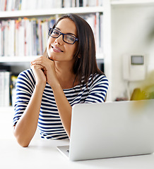 Image showing Portrait, woman and smile of student on laptop in home for remote learning, study or distance education at table. Face, glasses and happy person on computer at desk with online technology in Brazil