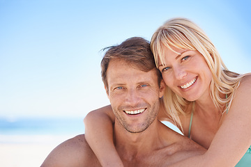 Image showing Portrait, love and happy couple hug at a beach with support, gratitude and bonding in nature together. Travel, face and people embrace at the ocean for adventure, romance and summer, fun or holiday