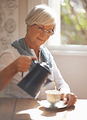 Image showing Senior, woman and tea in home for morning, brunch or calm routine in retirement, holiday or vacation. Mature, person and pouring liquid on coffee break or relax in apartment with drink at window