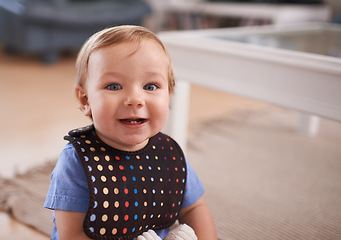 Image showing Boy, baby and smile in portrait at home, joy and curious or relax in living room on floor. Child development, happy kid and calm or comfortable, wellness and toddler for health and positive growth