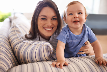 Image showing Mother, baby and portrait for care in hug, couch and support or relax in living room and comfortable. Mommy, son and affection for bonding in childhood, security and happiness in embrace or smile