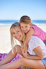 Image showing Portrait, mother and smile of kid on beach for vacation, summer or holiday with piggyback on blanket. Face, mom or happy girl at ocean for adventure, travel or family bonding together on mockup space