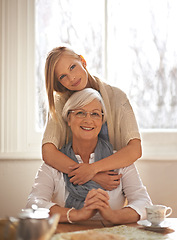 Image showing Grandma, grandchild and happiness with care in portrait at nursing home for visit and conversation with love. Mature woman, person and together for bonding with affection, family and embrace with hug