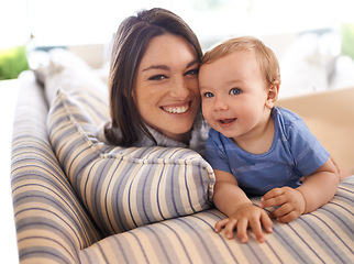 Image showing Mother, baby and portrait for love in embrace, care and support or relax in living room and comfortable. Mommy, son and affection for bonding in childhood, security and hug on couch or smile on face