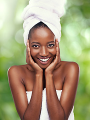 Image showing Black woman, portrait or hair towel in studio for skincare, wellness or dermatology results on green background. Beauty, cleaning and face of African lady model with cosmetic, pamper or spa aesthetic