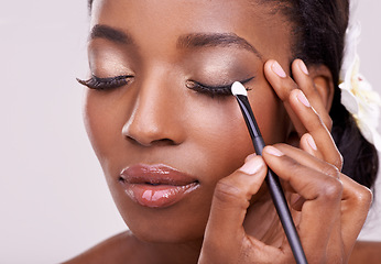 Image showing Black woman, face and brush for eyeshadow with beauty, makeup and lashes on grey background. Skin glow, hands and apply cosmetic product with tools for cosmetology, shimmer or glitter with shine