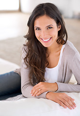 Image showing Portrait, smile or happy woman on couch to relax in living room on holiday in hotel, house or apartment. Face, sofa or female person with peace, wellness or confidence on break to rest for alone time