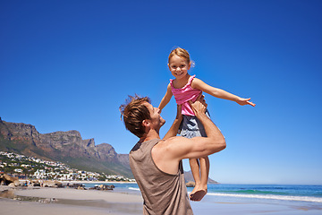 Image showing Love, airplane and father lifting child at a beach for travel, fun or bonding in nature together. Freedom, support and dad embrace girl at sea for morning games, playing or adventure in South Africa