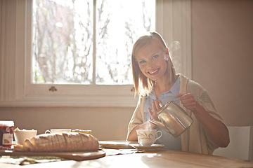 Image showing Pouring, tea and portrait of woman in home with calm routine, morning and drink on table. Girl, relax and coffee break with food, bread or teapot for breakfast preparation on holiday or vacation