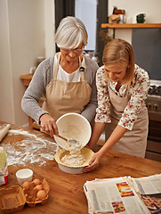 Image showing Baking, food and senior mother with daughter in kitchen of home together for pastry preparation. Cake, dough or flower with parent and woman in apartment, cooking ingredients for family bonding