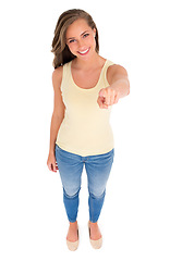 Image showing Woman, portrait and pointing to show winner, opportunity or choice in studio with isolated white background. Top view, smile and female model for hand gesture, vote or information by mockup space.