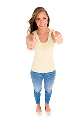 Image showing Thumbs up, smile and woman for motivation, success or approval in studio with isolated white background. Top view, hand gesture and female person for agreement, like emoji and yes sign on mockup.