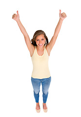 Image showing Woman, smile and thumbs up for winning achievement, success or support in studio with isolated white background. Top view, hand gesture and female model for like emoji, agreement and yes sign.