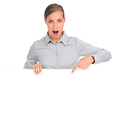 Image showing Woman, mockup and studio with pointing at poster with wow for business marketing and company on white background. Female person, entrepreneur and promote with copy space for display and branding
