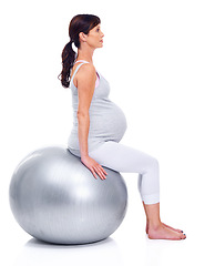 Image showing Pregnant female person, ball and white background for final trimester, wellness and exercise for motherhood. Maternal woman, workout and studio for health, fitness and pregnancy to keep in shape