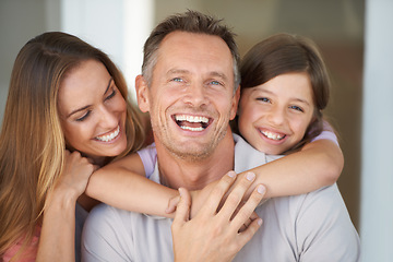 Image showing Mom, dad and girl in portrait in home, relax care and happy bonding together in family house. Mother, father and daughter with smile, love and weekend fun with support for man, woman and child