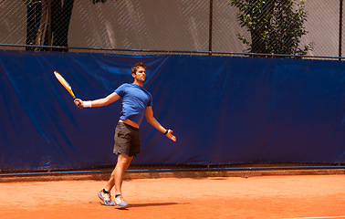 Image showing Man, play and court for tennis match, training and tournament for competition or lifestyle. Male person, professional and game for practice or fitness for championship, recreation and racket sport