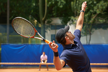 Image showing Fitness, sports and tennis with man serving on court to start match for competition or game from back. Exercise, health or training and man with racket at stadium or venue for beginning of tournament