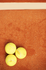 Image showing Fitness, tennis and balls on court closeup from above for start of competition, game or match. Sports, mockup or space on ground at stadium or venue, ready for club of championship tournament