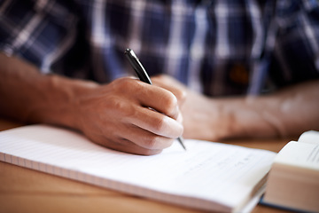 Image showing Student, hand and writing notes in university, learning and knowledge on college campus. Education, person and closeup of information for exams, planning and scholarship for studying or revision