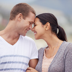 Image showing Couple, affection and happy in outdoor with bonding for honeymoon, love and relax for leisure. Closeup, relationship and smile on break for date with support, forehead touch and care for trust.