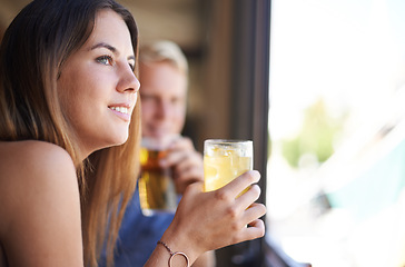 Image showing Smile, woman and drinking alcohol at pub, thinking and relax at restaurant for celebration at club. Bar, glass and dream of happy person with a cocktail or beverage at cafe for party with friends