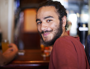 Image showing Student man, smile and pub with beer, party and group fun with alcohol. Social, happy hour and campus restaurant for Turkish learner, celebration and weekend relax after exams or university project