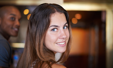 Image showing Portrait, smile and a woman at cafe to relax, cheerful and positive facial expression for leisure at restaurant in Australia with bokeh. Face, cafeteria and happy young person or casual customer