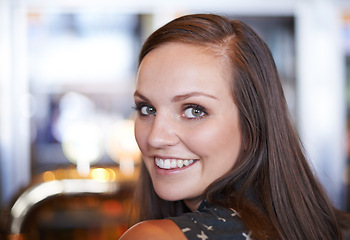 Image showing Portrait, woman and smile in pub for celebration, party and social event to relax. Female person, positive and joyful in club or restaurant for drink, beer or alcohol and enjoying for happiness