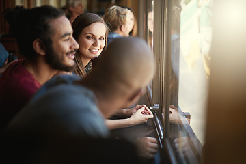 Image showing Smile, happy and friends at window of coffee shop together for bonding or conversation on weekend. Relax, summer or table with group of young men and women talking in cafe or restaurant for time off