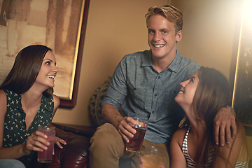 Image showing Portrait, happy friends and drinking beer in pub at party for celebration together at restaurant. Smile, group and people with alcohol, beverage or glass at bar while talking at social gathering
