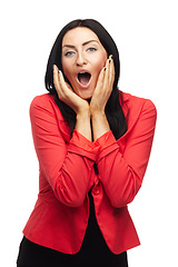 Image showing Portrait, woman with surprise or shock in studio, reaction and facial expression for news or announcement. Winner with open mouth, OMG and hands on face for success or achievement on white background