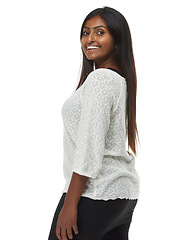 Image showing Portrait, Indian woman and smile in studio, fashion and casual wear on white background. Confidence, happy and contemporary style for gen z female model, trendy outfit and clothing for Mumbai lady