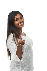 Image showing Woman, studio and happy to point at you in portrait, recruitment or choice by white background. Indian person, hr manager and smile for decision for onboarding with fashion, hiring or call to action