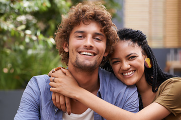 Image showing Portrait, couple and lovers with embrace, smile and love outdoors in garden, backyard and patio. Male person, black woman and interracial partners with diversity, affection and bonding in Jamaica